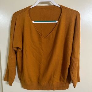 Cropped v-neck golden sweater